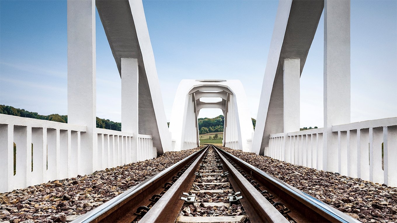 Seeing Through the White Concrete Railway Bridge 