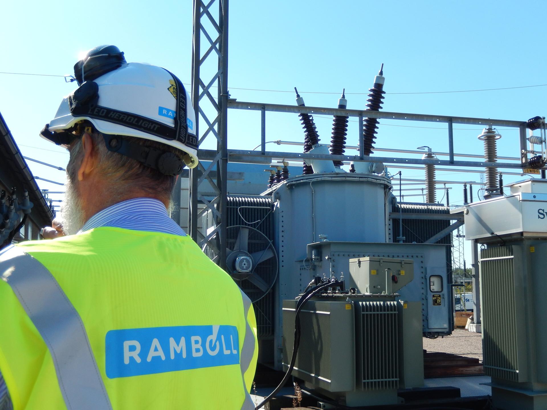 Man standing on a transformer station