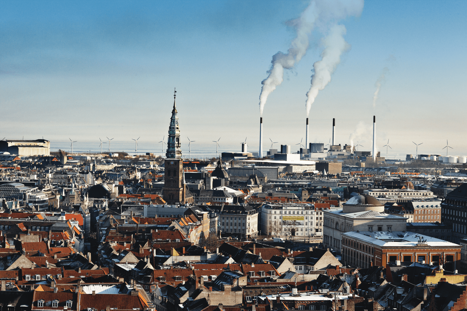 Arial view of Copenhagen with red roofs and iconic historic buildings