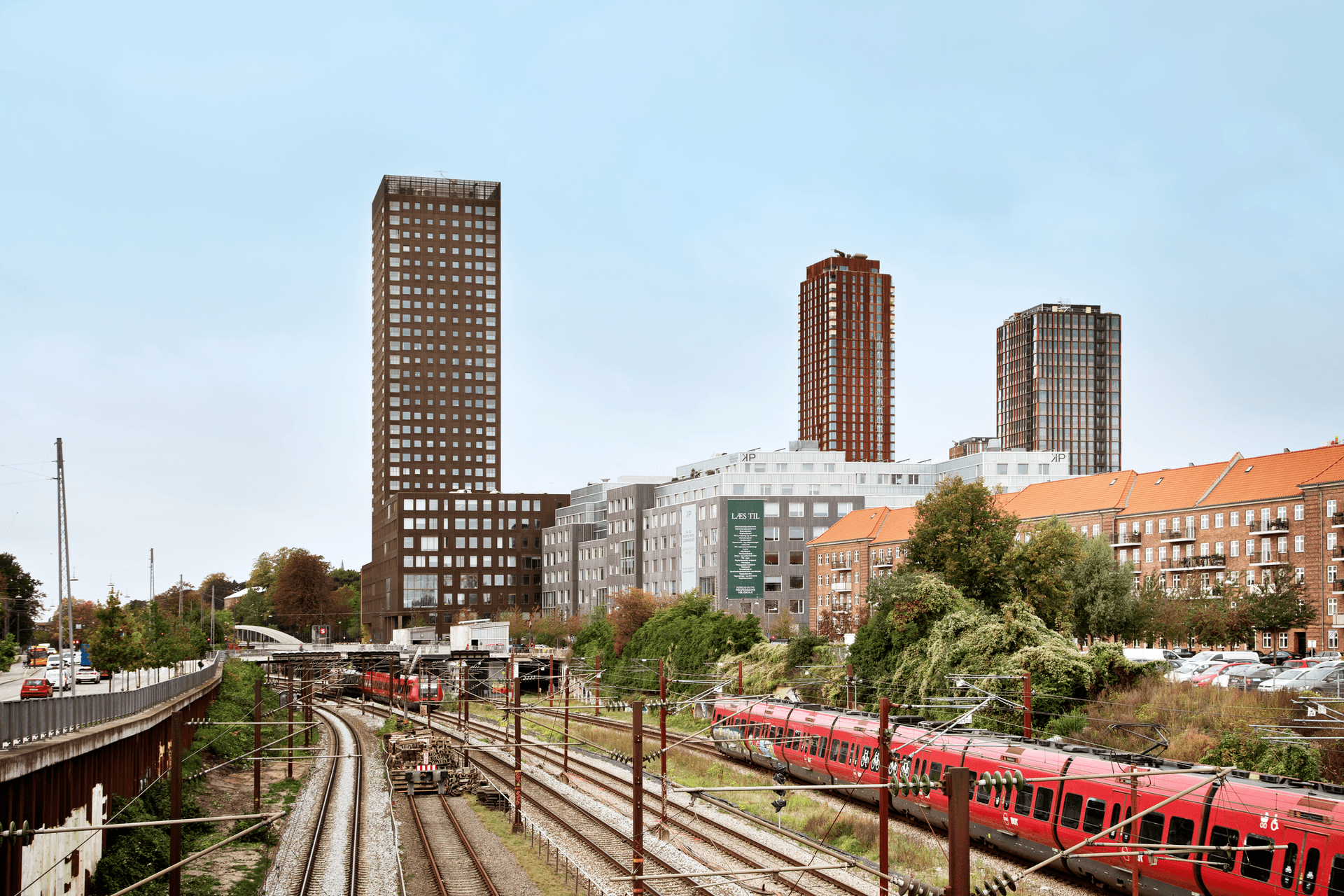 View of Bohrs Tower and Carlsberg station with train and train tracks